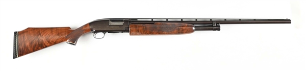 (C) WINCHESTER MODEL 12 SLIDE ACTION SHOTGUN.