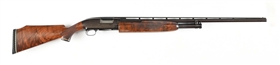 (C) WINCHESTER MODEL 12 SLIDE ACTION SHOTGUN.