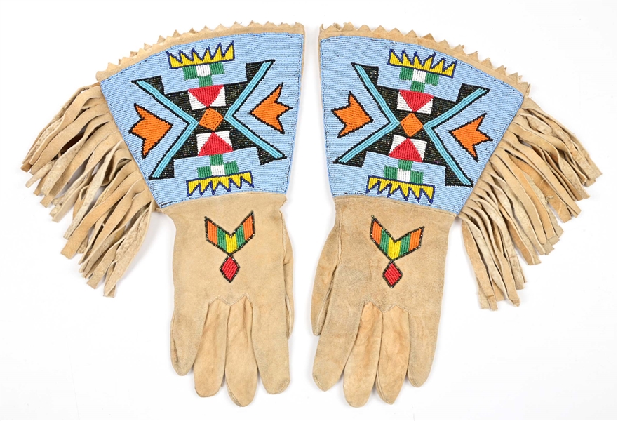 PAIR OF NATIVE AMERICAN BEADED GEOMETRIC PATTERNED GAUNTLETS.