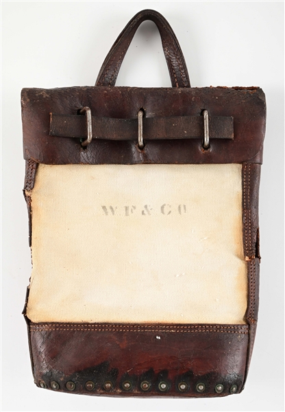 LEATHER AND CANVAS TOTE BAG. 