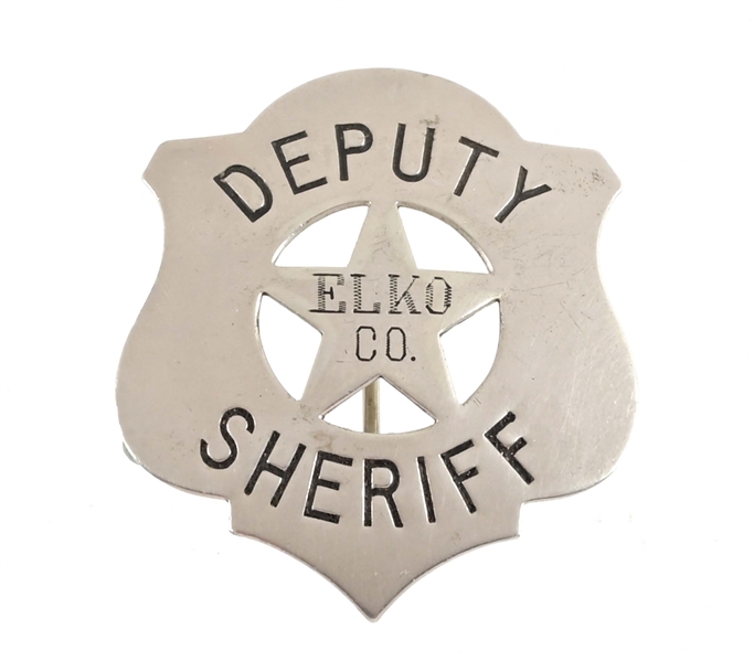 ELKO COUNTY DEPUTY SHERIFF BADGE.