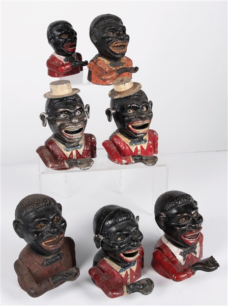 COLLECTION OF 7 BLACK AMERICANA COIN BANKS