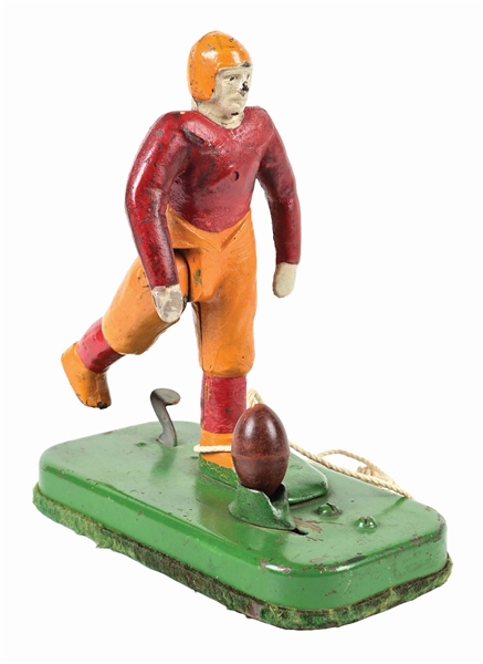 CAST IRON PRE-WAR WOOLSEY MECHANICAL CAST IRON FOOTBALL PLAYER W/ ORIGINAL FOOTBALL