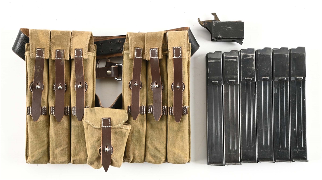 GERMAN WWII MP-40 MAGAZINES IN REPRODUCTION POUCHES. 