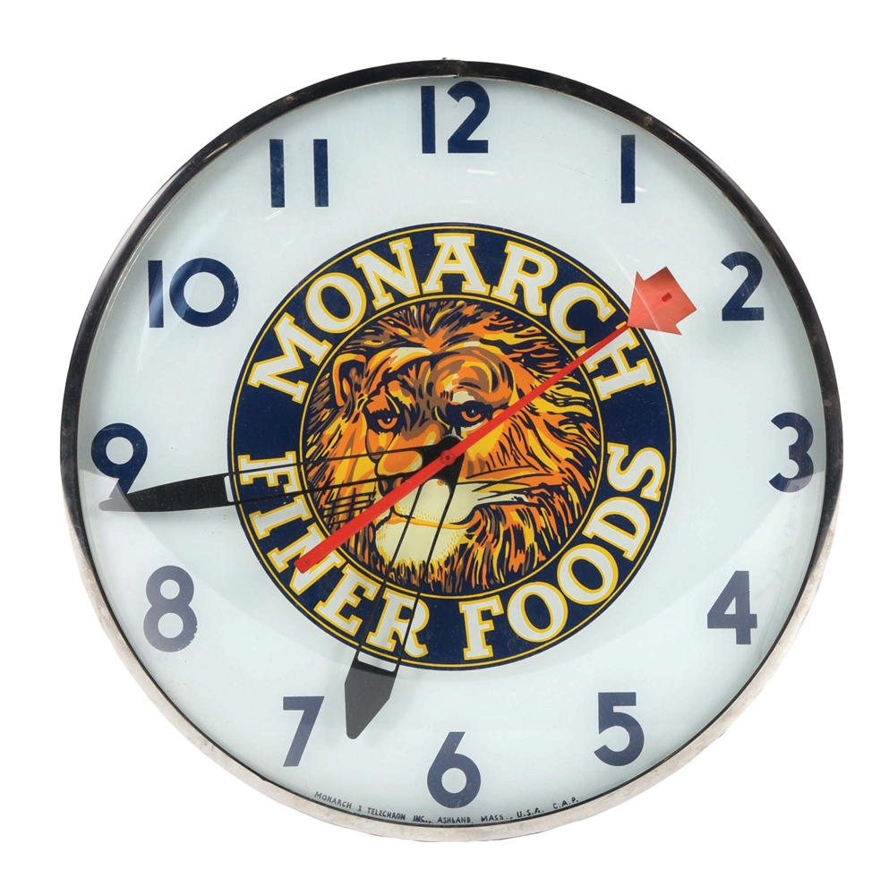 MONARCH FINER FOODS CLOCK W/ LION GRAPHIC