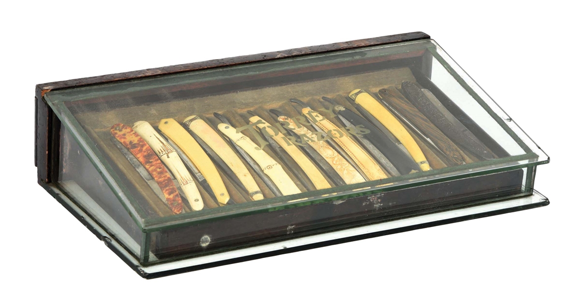 TORREY RAZORS DISPLAY CASE W/ 12 RAZORS