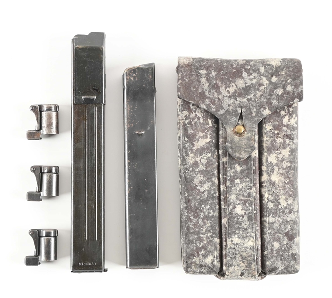 LOT OF GERMAN SUBMACHINE GUN MAGS AND K98 MUZZLE COVERS.