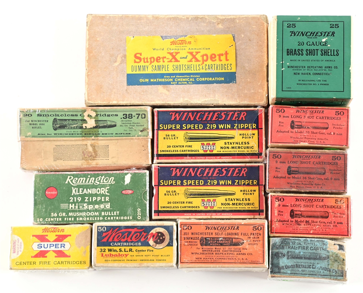 LOT OF TWELVE FULL BOXES OF COLLECTIBE AMMO AND WESTERN DUMMY SALESMAN SET