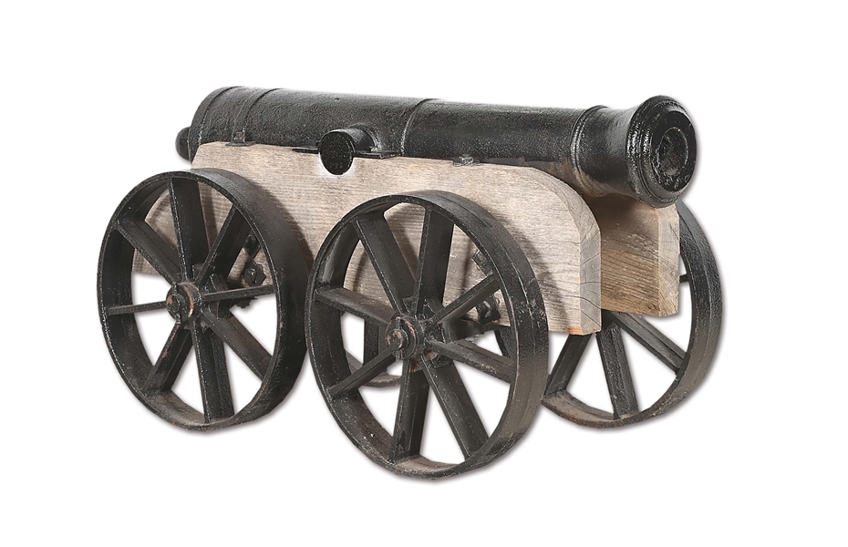 (A) A WAR OF 1812 U.S. IRON 6-POUNDER CANNON ON LATER TRUCK CARRIAGE.