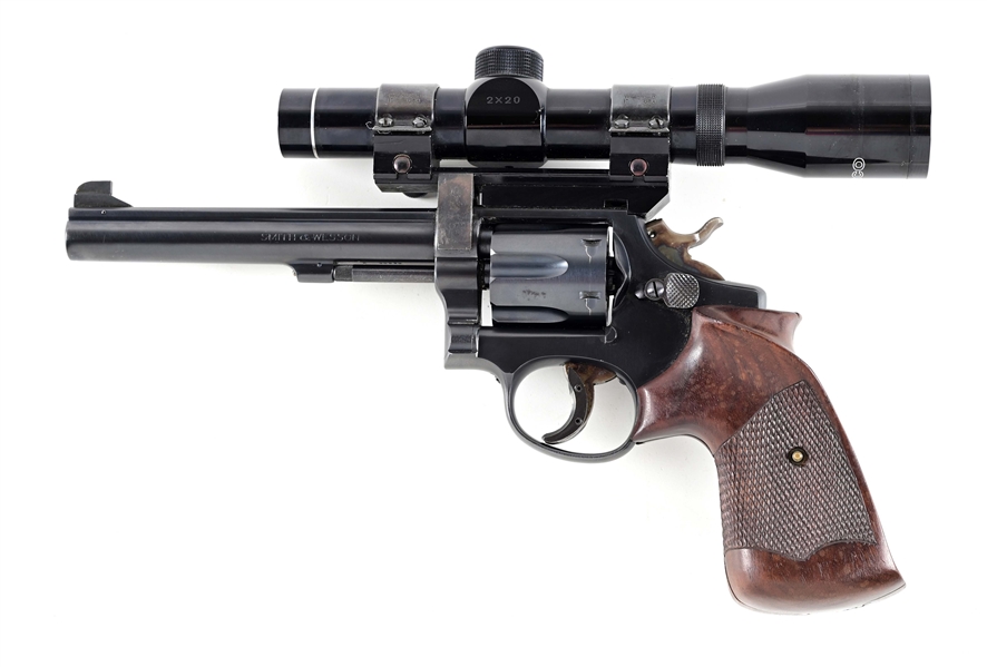 (C) SMITH & WESSON K38 DOUBLE ACTION TARGET REVOLVER.