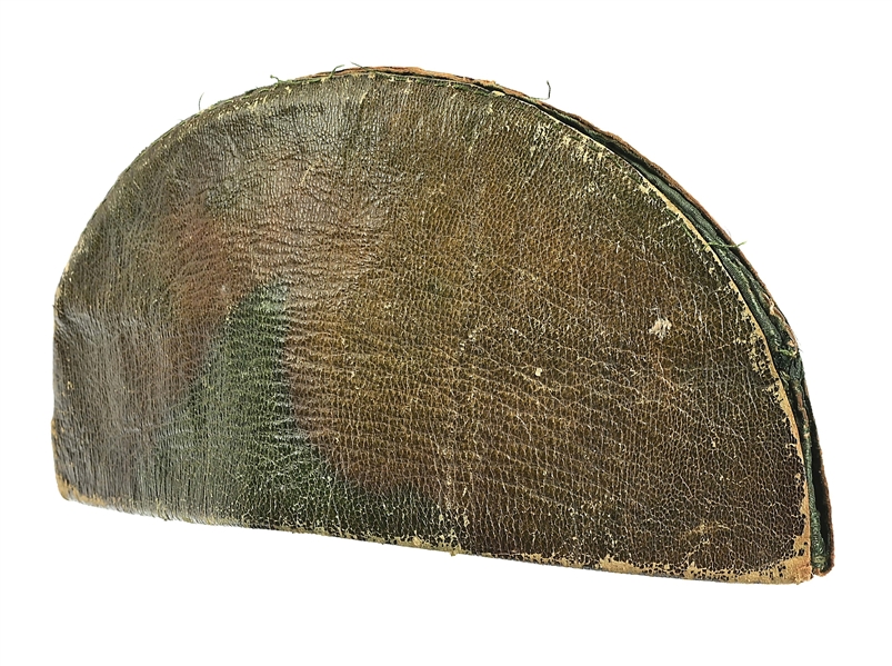 AN OFFICERS FOLDING CAP OF GREEN MOROCCO LEATHER, DATED 1795.