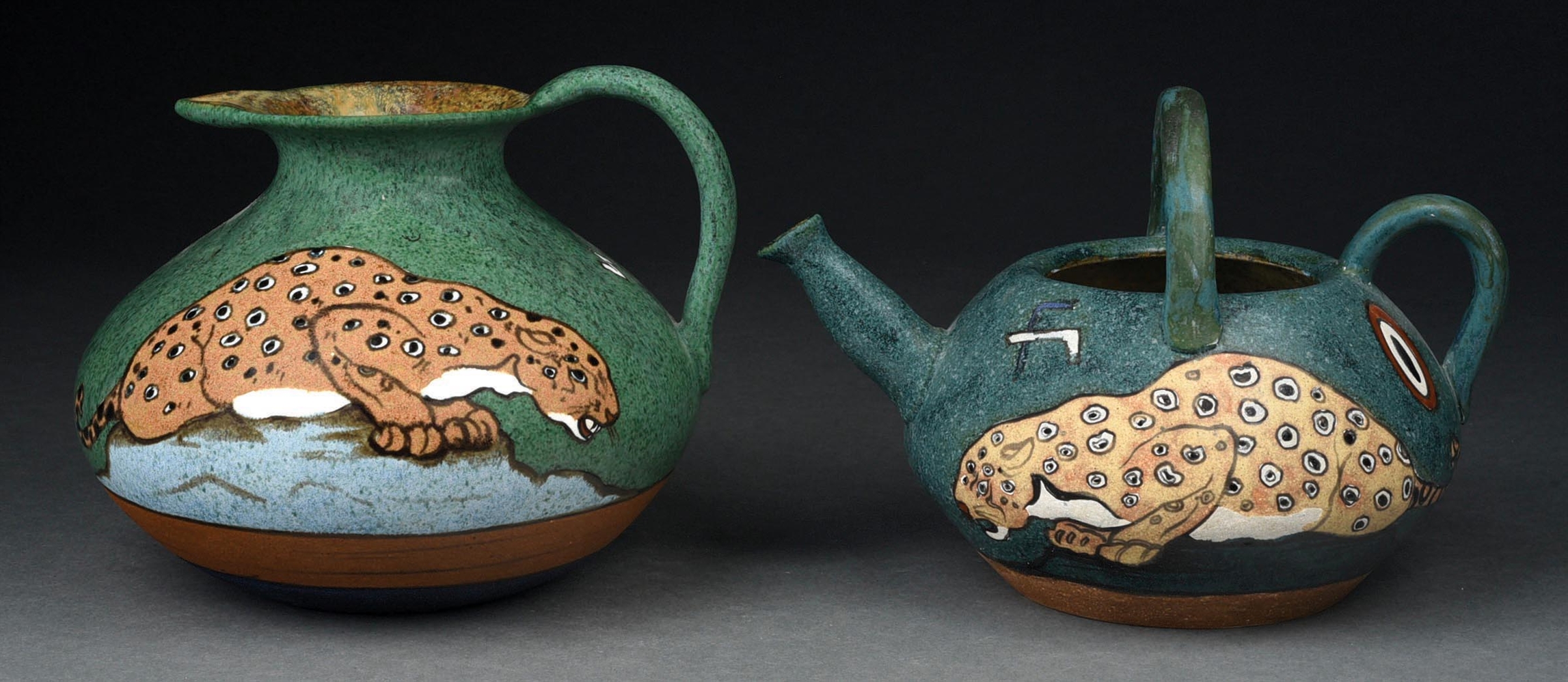 PAIR OF STELLMACHER EARTHENWARE JAGUAR PITCHERS