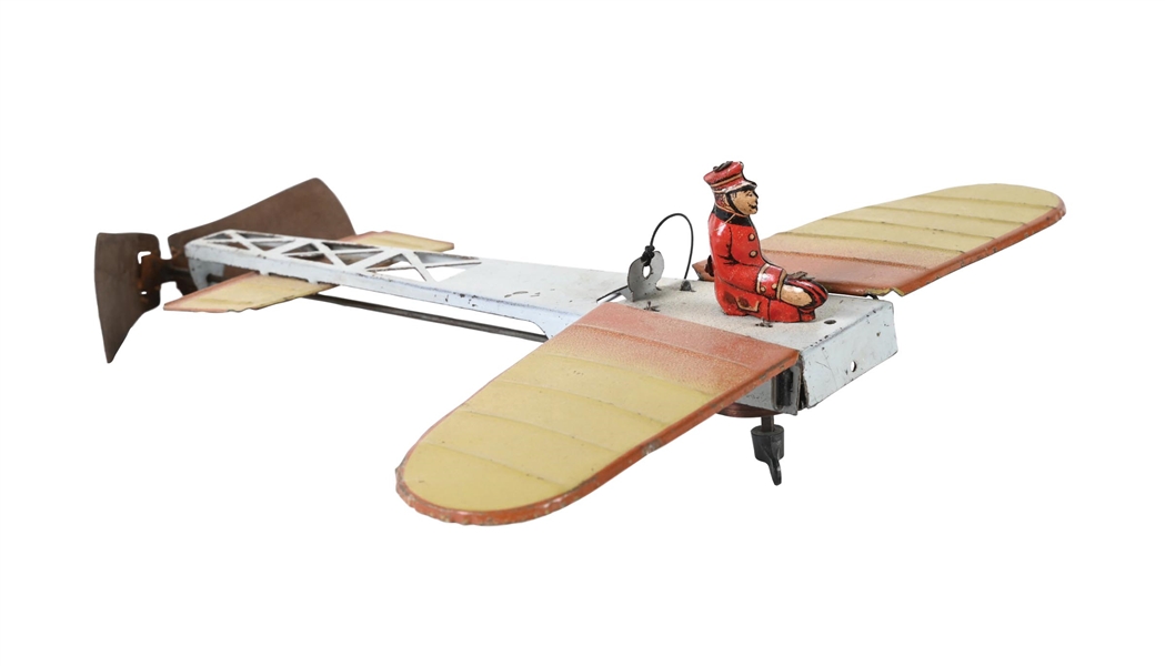 GERMAN TIN LITHO WIND-UP FLAPPING WING AIRPLANE