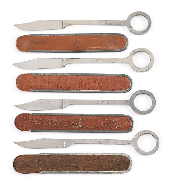 LOT OF 4: MARBLE’S ALL METAL TROUT FISHING KNIVES WITH ORIGINAL LEATHER POUCHES.