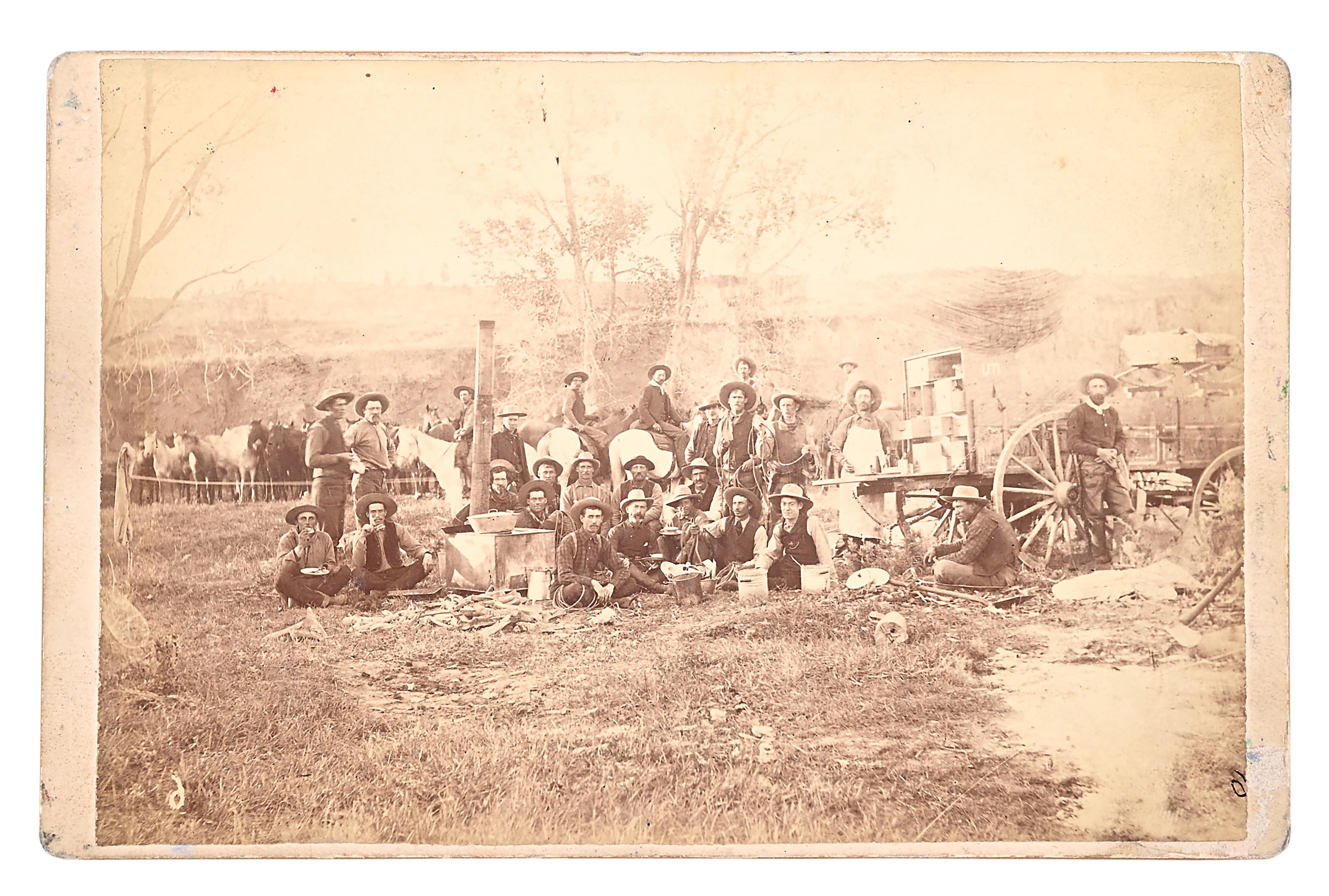 Lot Detail - O.S. GOFF CABINET PHOTO OF COWBOYS AND CHUCK WAGON.