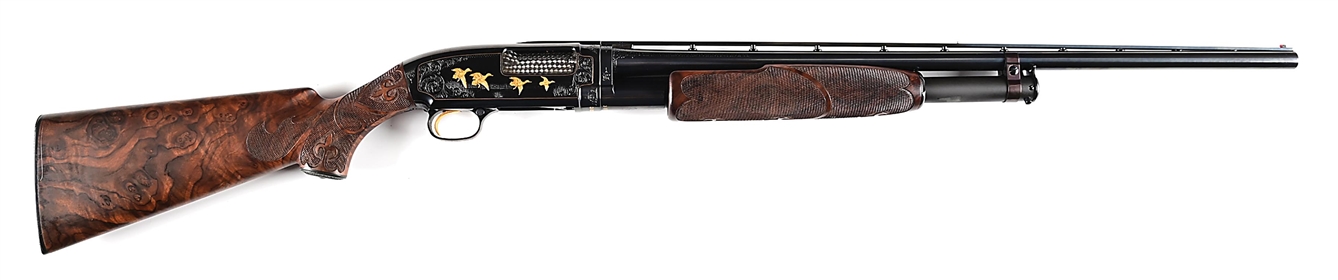 (C) JOHN KUSMIT ENGRAVED WINCHESTER MODEL 12 PIGEON GRADE SLIDE ACTION 20 GAUGE SHOTGUN.