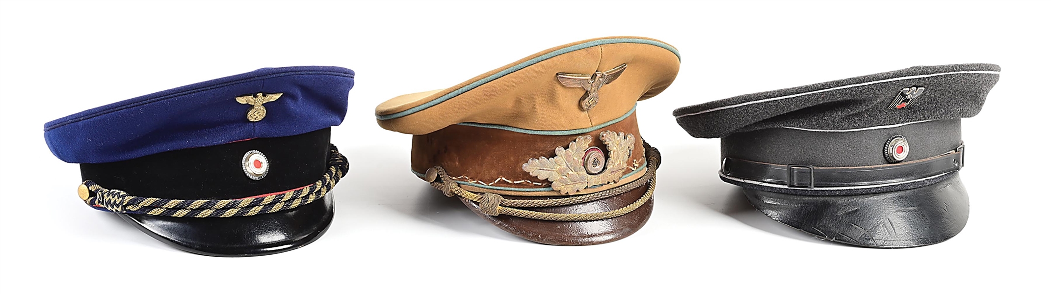 LOT OF 3: THIRD REICH POLITICAL LEADER, REICHSBAHN, AND RED CROSS VISOR CAPS.
