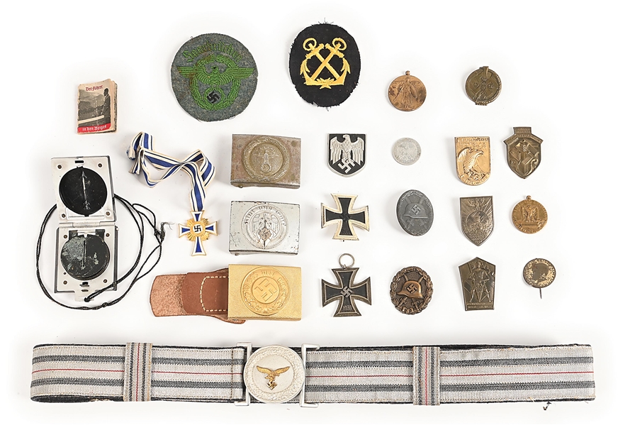 LOT OF MISCELLANEOUS GERMAN WWII INSIGNIA, BADGES, AND BUCKLES.