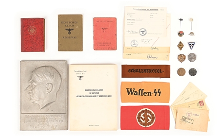 LOT OF MISCELLANEOUS THIRD REICH ARMBANDS, DOCUMENTS, AND METAL PLAQUE.