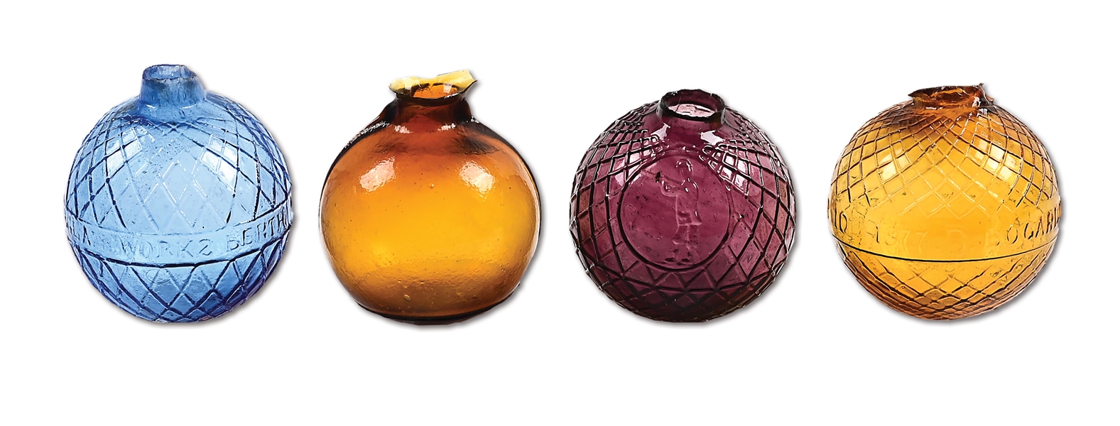 LOT OF 4: GLASS TARGET BALLS INCLUDING A RARE HONEY AMBER BOGARDUS BALL