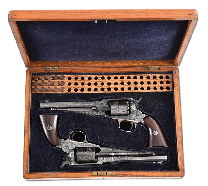 (A) PAIR OF ENGRAVED REMINGTON NEW MODEL BELT MODEL .38 RF SINGLE ACTION REVOLVERS IN FRENCH FITTED CASE.
