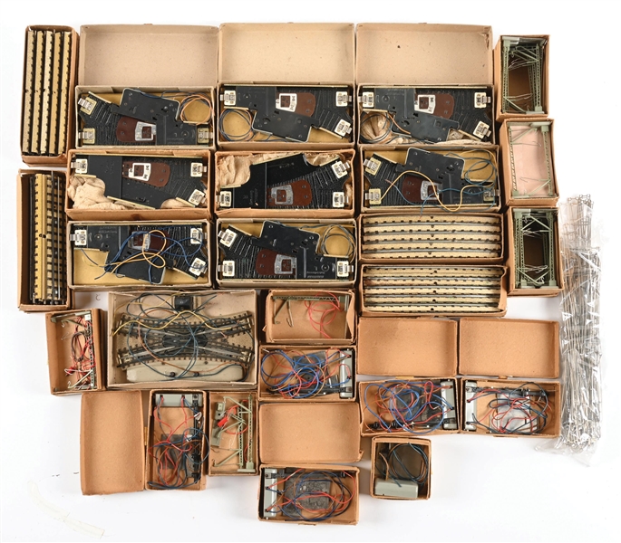 LOT OF 25: ASSORTED MARKLIN HO-GA. TRAIN TRACKS AND ACCESSORIES IN EARLY BOXES