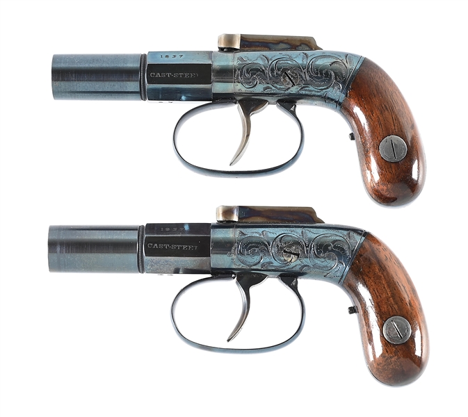 (A) CASED PAIR OF J&D EATON PERCUSSION MUFF PISTOLS.