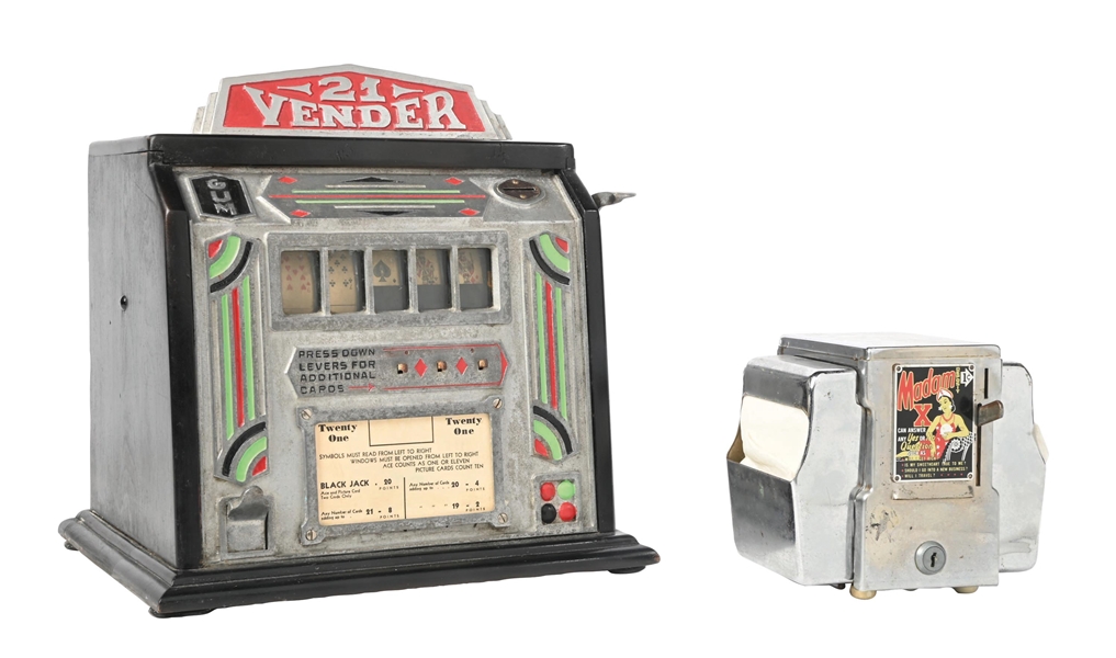 A PAIR OF COIN OPERATED MACHINES: GROETCHEN 21 VENDER & MADAM X NAPKIN FORTUNE TELLER