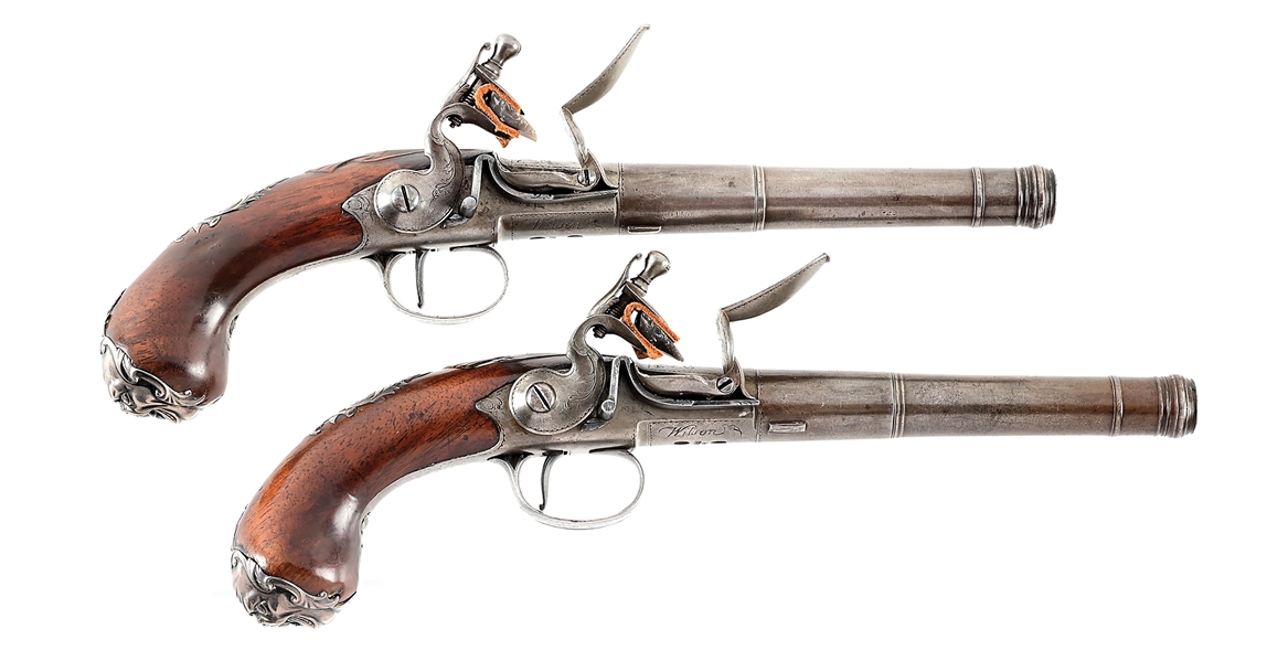 (A) PAIR OF QUEEN ANNE STYLE BRITISH SILVER MOUNTED FLINTLOCK PISTOLS BY WILSON.