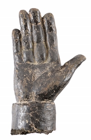 THE HAND THAT RULED IRAQ: SADDAM HUSSEIN BRONZE STATUE FRAGMENT FROM THE IRAQI MINISTRY OF FINANCE.