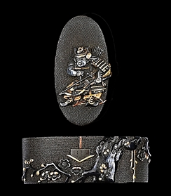 FUCHI KASHIRA SIGNED MASATSUNE WITH DESIGNS OF PLUM TREE AND SAMURAI