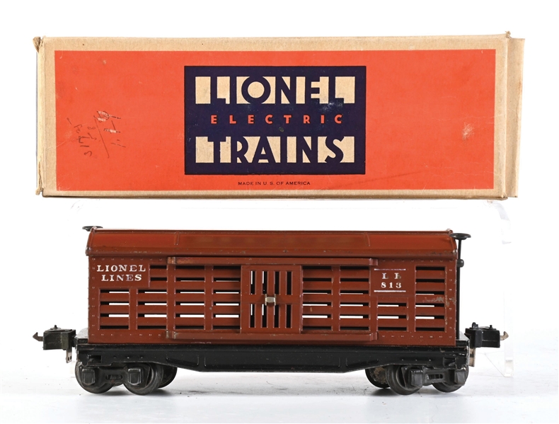PRE-WAR LIONEL O-GA. NO. 813 TUSCAN RUBBER-STAMPED CATTLE CAR WITH ORIGINAL BOX
