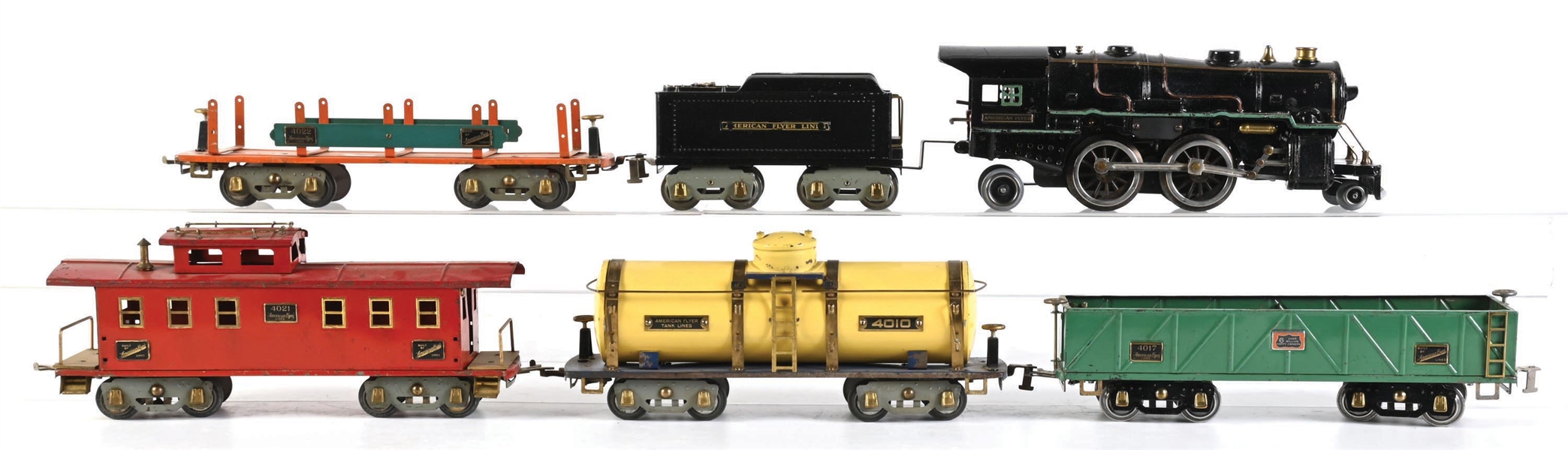LOT OF 6: AMERICAN FLYER STANDARD GA. NO. 4670 CAST IRON STEAM LOCOMOTIVE WITH FREIGHT CARS