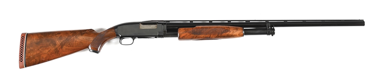 (C) FINE WINCHESTER DELUXE MODEL 12 SLIDE ACTION 12 GAUGE SHOTGUN (1971)