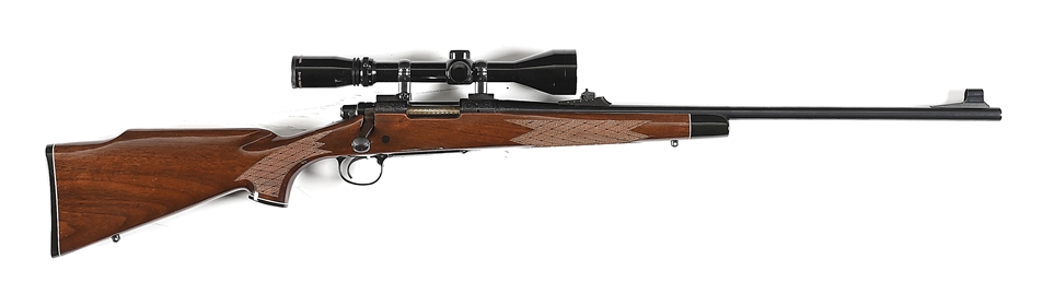(M) DELUXE ENGRAVED REMINGTON MODEL 700 .22-250 BOLT ACTION RIFLE.