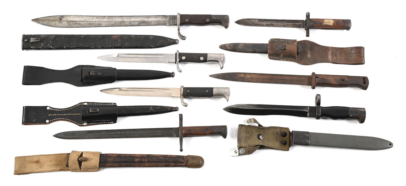 LOT OF 7: GERMAN, ITALIAN, AND SPANISH BAYONETS.