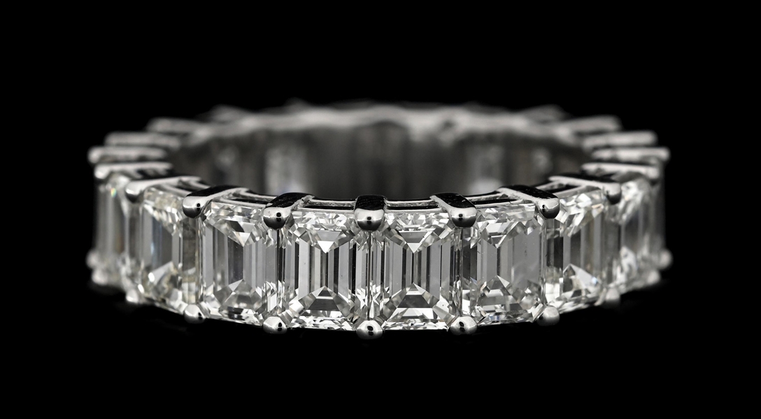 PLATINUM EMERALD CUT DIAMOND ETERNITY BAND, 6.46CT TW