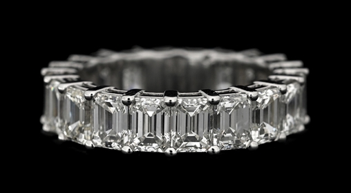 PLATINUM EMERALD CUT DIAMOND ETERNITY BAND, 6.46CT TW