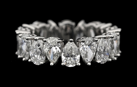 PLATINUM PEAR SHAPE DIAMOND ETERNITY BAND, 5.82CT TW