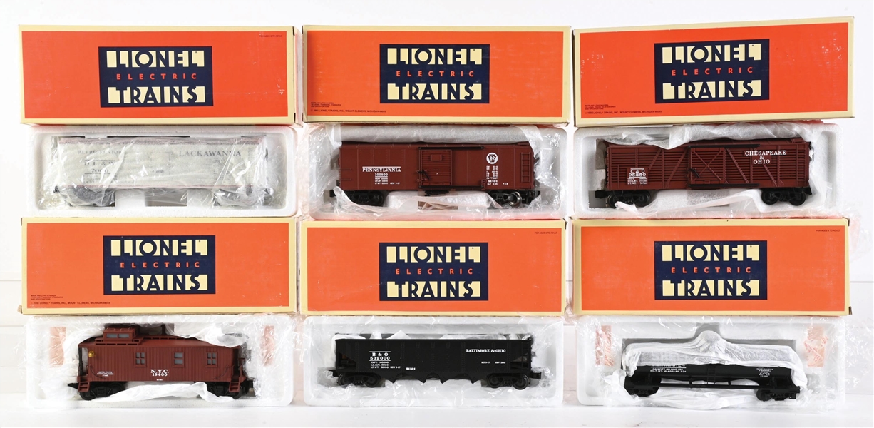 LOT OF 6: LIONEL O. GAUGE MODERN ERA SEMI-SCALE FREIGHT CARS WITH ORIGINAL BOXES