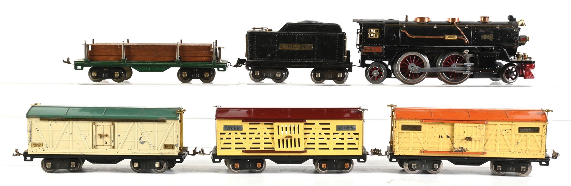 LIONEL PREWAR STANDARD GAUGE NO. 390 STEAM LOCOMOTIVE AND TENDER WITH 4 ASSORTED STANDARD GAUGE FREIGHT CARS