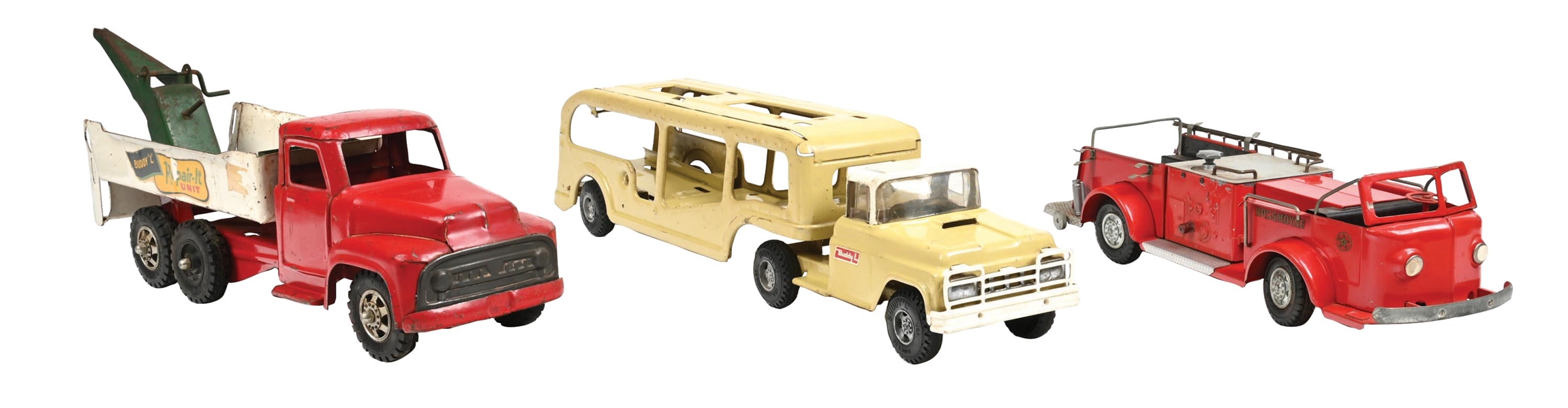 LOT OF 3: BUDDY "L" REPAIR-IT UNIT TOW TRUCK, YELLOW CAR CARRIER AND ROSSMOYNE AMERICAN LAFRANCE AERIAL LADDER FIRE TRUCK