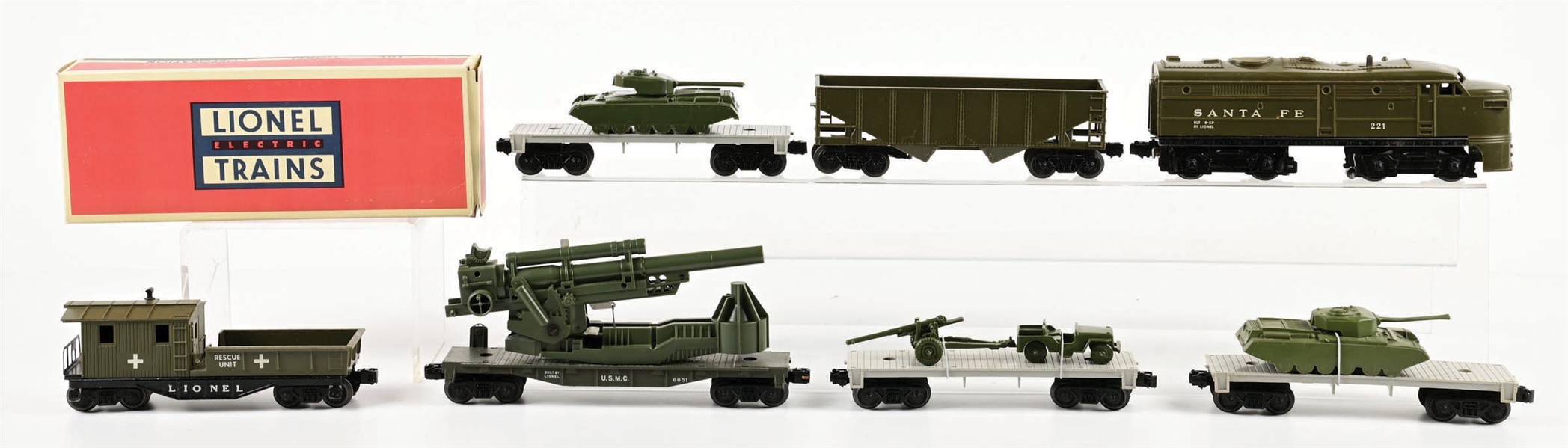 LOT OF 7: POST-WAR LIONEL O-GA. NO. 221 SANTA FE ALCO DIESEL & 6 ASSORTED MILITARY FREIGHT CARS