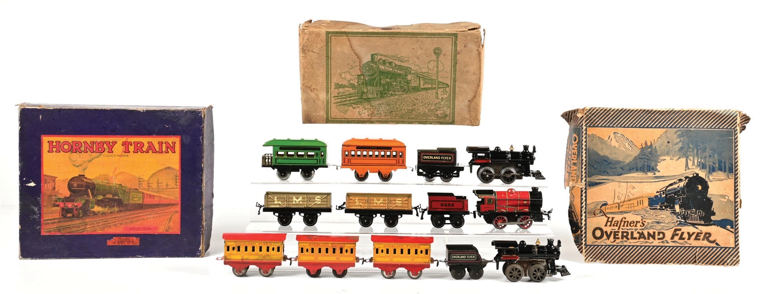 LOT OF 3: PRE-WAR O-GA. HAFNER OVERLAND FLYER & HORNBY WIND-UP PASSENGER & FREIGHT TRAIN SETS W/ ORIGINAL BOXES