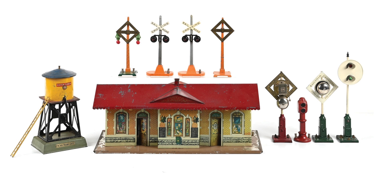 LOT OF 10: PRE-WAR IVES NO. 116 STATION, NO. 89 WATER TOWER, & 8 ASSORTED IVES, LIONEL, & DORFAN RAILROAD SIGNALS