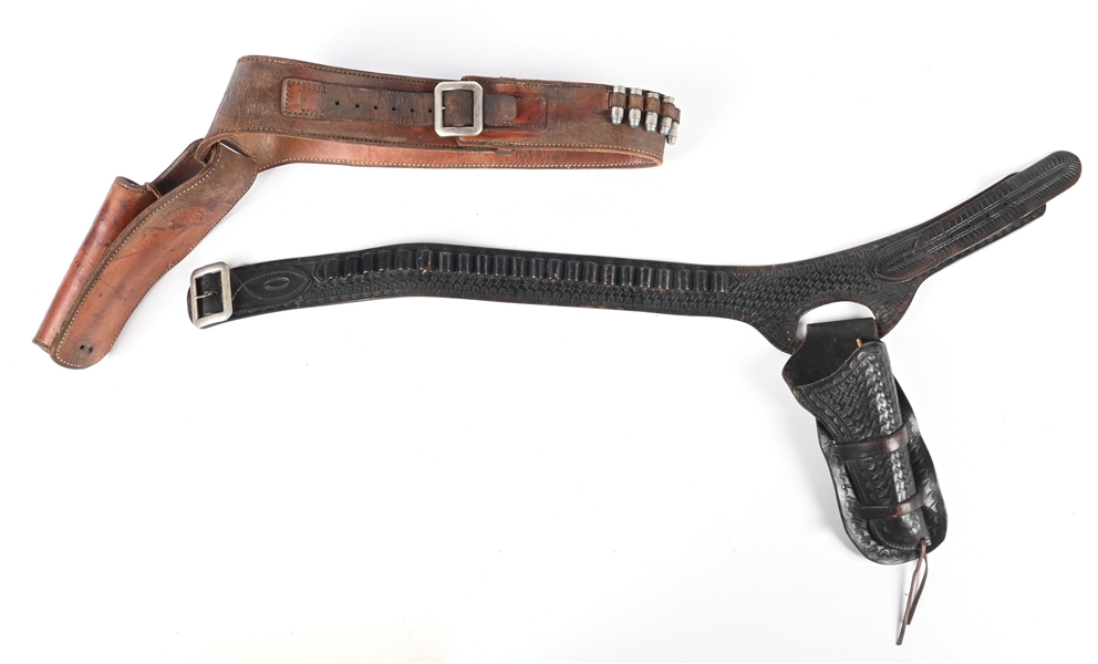 LOT OF 2: LEATHER SINGLE HOLSTER REVOLVER BELT RIGS.