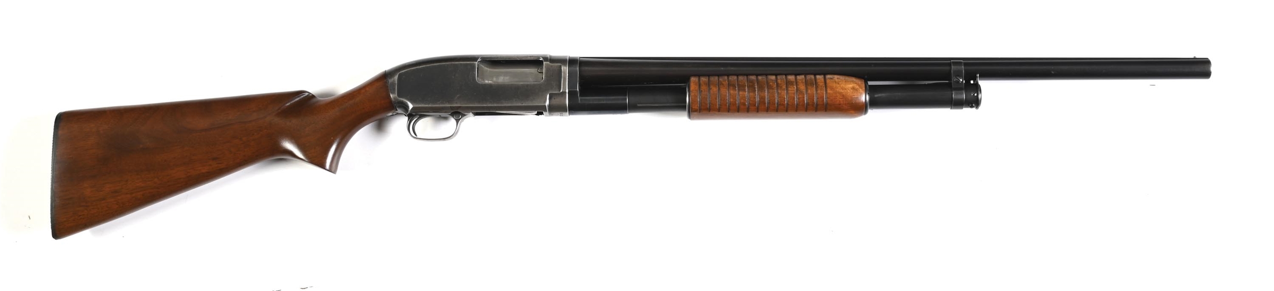 (C) PRE-WAR WINCHESTER MODEL 12 SLIDE ACTION SHOTGUN.
