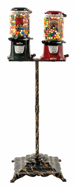 PAIR OF RESTORED COLUMBUS GUMBALL MACHINES ON A COLUMBUS STAND