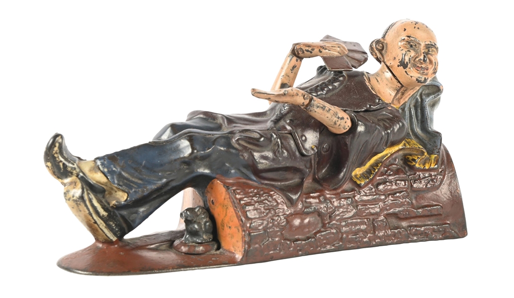 J. & E. STEVENS CO. RECLINING CHINAMAN CAST IRON MECHANICAL BANK