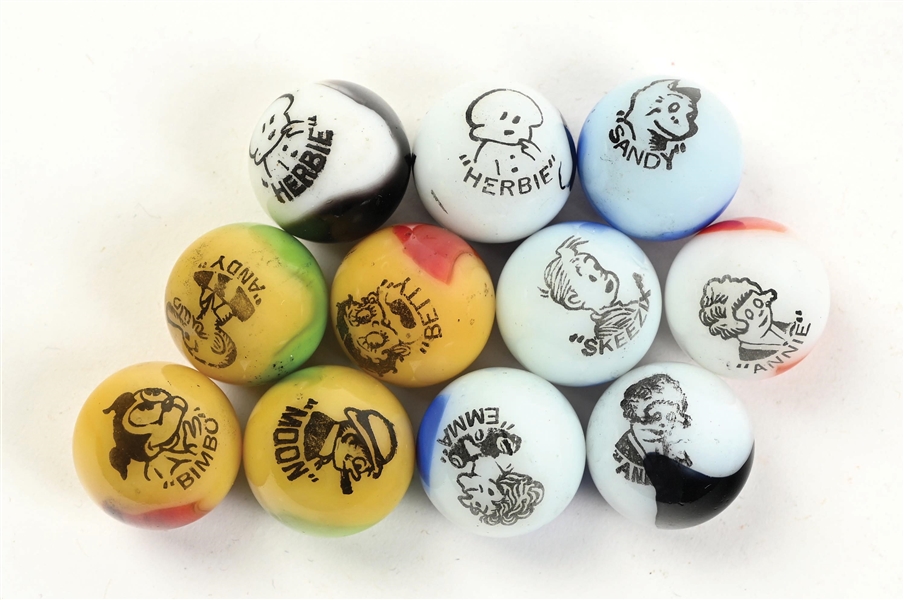 LOT OF 11: PELTIER COMIC STRIP MARBLES
